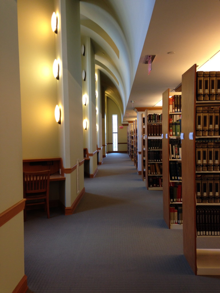 Reading cubbyholes on the left, book stacks on the right. Heaven!