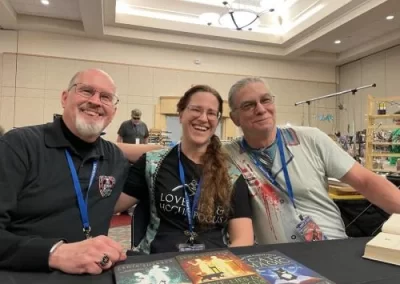 Lydia posing with fellow authors.